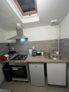 Η κουζίνα ή μικρή κουζίνα στο Self Contained Studio - Belinda Road