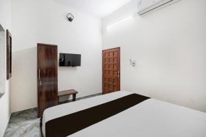 Μια τηλεόραση ή/και κέντρο ψυχαγωγίας στο Hotel O Grandview Mansion