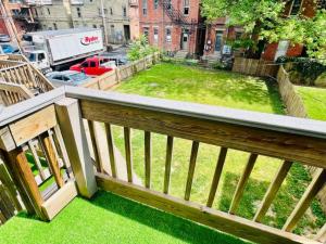 a view of a yard from a balcony at Prime Location Top Rated Clean Parking Free! in Columbus