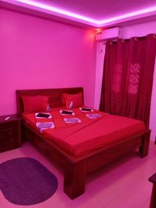 Ένα ή περισσότερα κρεβάτια σε δωμάτιο στο Baobab IMMO Thies