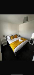Ένα ή περισσότερα κρεβάτια σε δωμάτιο στο Santana Apartments Brighton +5 φωτογραφίες