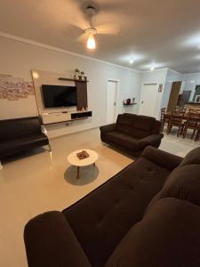 Μια τηλεόραση ή/και κέντρο ψυχαγωγίας στο Casa Grande em Ótima localização em Maresias +62 φωτογραφίες