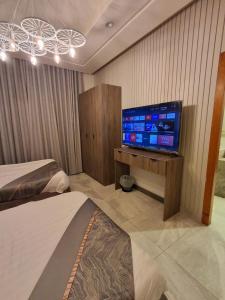 En eller flere senge i et værelse på شقه فندقيه بغرفه نوم واحده