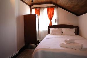 Postel nebo postele na pokoji v ubytování Paşabahçe Konağı + 14 fotografií