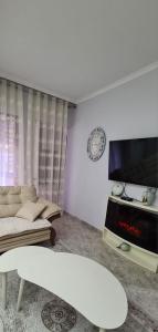 TV a/nebo společenská místnost v ubytování Laura property + 16 fotografií