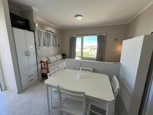 Kuchyň nebo kuchyňský kout v ubytování Complejo LA OMA, ubicado a 400 mts del mar con estacionamiento privado