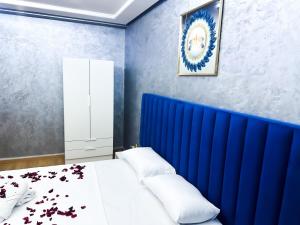 Ένα ή περισσότερα κρεβάτια σε δωμάτιο στο Moderne Studio location a coté du Stade Ibn Batouta de Tanger