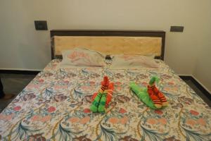 Voodi või voodid majutusasutuse Shivlata home stay toas