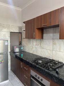 Kuchyň nebo kuchyňský kout v ubytování Baobab 2B, Bamburi