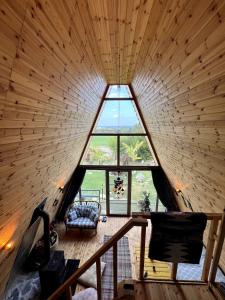 a room with a large window in a cabin at Blue Bungalow Of Cyprus 