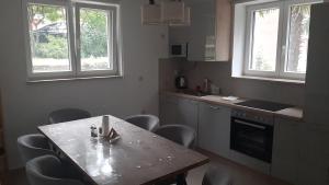 Kuchyň nebo kuchyňský kout v ubytování Apartman Andrić