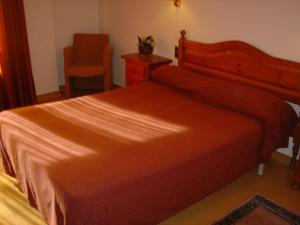 
Кровать или кровати в номере Apartaments L'Orri
