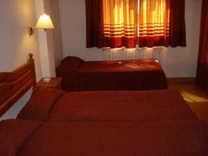 Cama o camas de una habitación en Apartaments L'Orri
