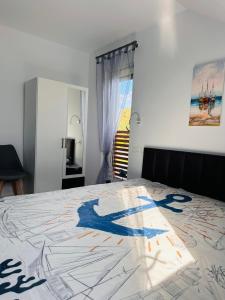 Katil atau katil-katil dalam bilik di LUZIE Breeze House
