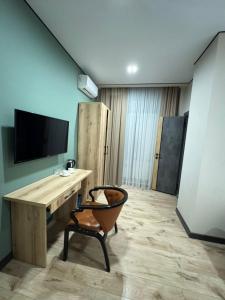 TV a/nebo společenská místnost v ubytování Mokk Hotel