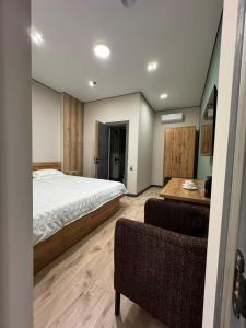 Postel nebo postele na pokoji v ubytování Mokk Hotel