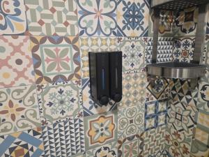 a wall with a bunch of different types of tiles at Atardecer dorado in Ruidera +52 photos