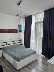 Una cama o camas en una habitación de Event Villa Saguramo
