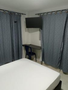 Μια τηλεόραση ή/και κέντρο ψυχαγωγίας στο Hotel Villa Marta Cartagena