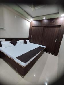 Ένα ή περισσότερα κρεβάτια σε δωμάτιο στο Hotel Mukhiya Palace +15 φωτογραφίες