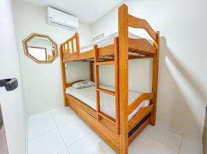 a couple of bunk beds in a small room at RSOlMAR2025 in Tamandaré