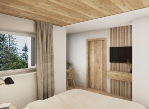 Μια τηλεόραση ή/και κέντρο ψυχαγωγίας στο AlpeLuce Mountain Chalet +7 φωτογραφίες