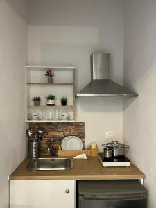 Η κουζίνα ή μικρή κουζίνα στο Agia Kiriaki rooms