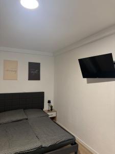 Un televizor și/sau centru de divertisment la Apartment-Whiskey-Hundefreundlich