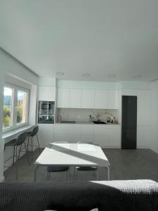 Kuchyň nebo kuchyňský kout v ubytování Apartamento moderno junto al MUSAC