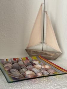 a magazine with a picture of a boat on it at Zentral und komfortabel an der Kathedrale in Fribourg