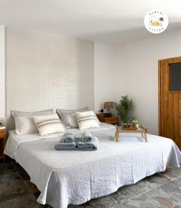Una cama o camas en una habitación de Suite Amorosa by Babiniliving