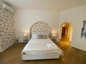 Postel nebo postele na pokoji v ubytování Suite Brera