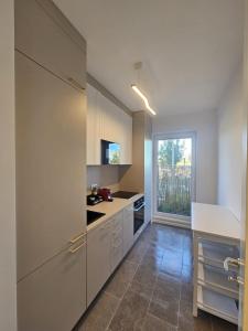 Η κουζίνα ή μικρή κουζίνα στο Atria House