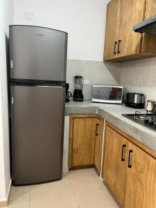 Køkken eller tekøkken på Hermosa Casa en la Zona Industrial de Monterrey