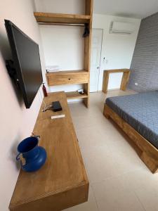 Et tv og/eller underholdning på Hermosa Casa en la Zona Industrial de Monterrey + 31 billeder