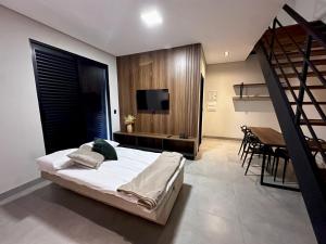 Postel nebo postele na pokoji v ubytování Lofts completos em Sinop MT + 105 fotografií