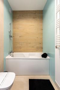 Ένα μπάνιο στο Sika Metropolis Grand Apartment +35 φωτογραφίες
