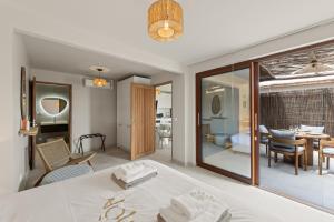 Giường trong phòng chung tại NÔA Curacao +57 ảnh