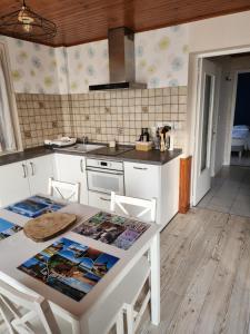 Cuisine ou kitchenette dans l'établissement Chez David et Julie