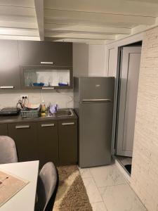 Nhà bếp/bếp nhỏ tại Galerija apartman