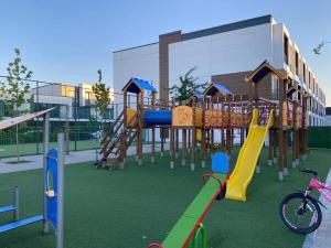 a playground with a slide and a slideintend at Chișinău Arena in Chişinău