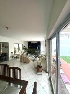 a living room with a couch and a table at B&B Villamar Chorrillos in San Antonio