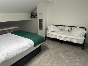 Ένα ή περισσότερα κρεβάτια σε δωμάτιο στο Apartment 3 Shipley