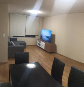 TV o dispositivi per l'intrattenimento presso ESTANCIA EN APARTAMENTO EN Chiclayo