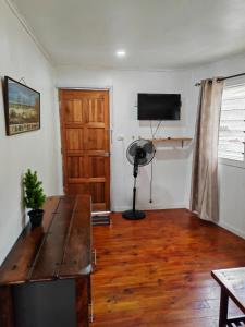 TV a/nebo společenská místnost v ubytování ACAs HAVEN