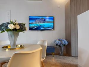 TV a/nebo společenská místnost v ubytování Casa Cavour + 2 fotografie