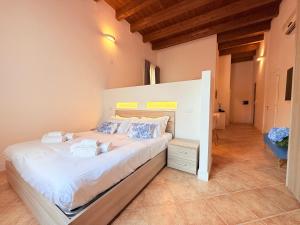 Postel nebo postele na pokoji v ubytování Casa Cavour