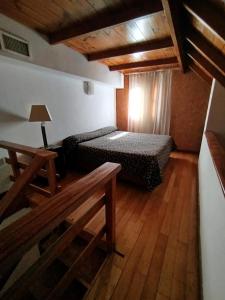 Postel nebo postele na pokoji v ubytování Casa Grande jóvenes + 9 fotografií