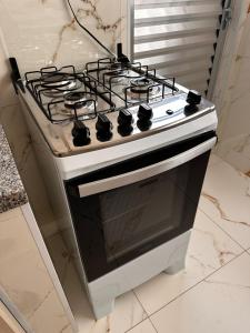 Η κουζίνα ή μικρή κουζίνα στο Apartamento 10 a 4 min da Basílica +19 φωτογραφίες