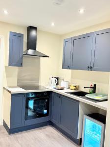 Kuchyň nebo kuchyňský kout v ubytování Flat 4 Garth House